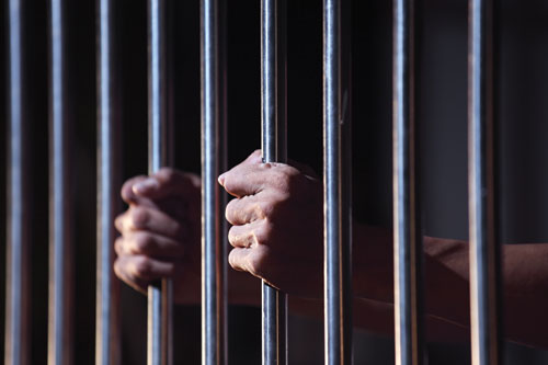 prisoner in jail